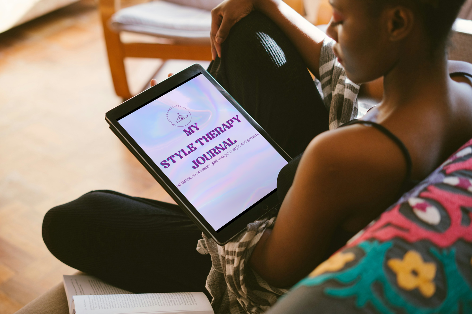 Woman with digital journal in hand on her tablet
