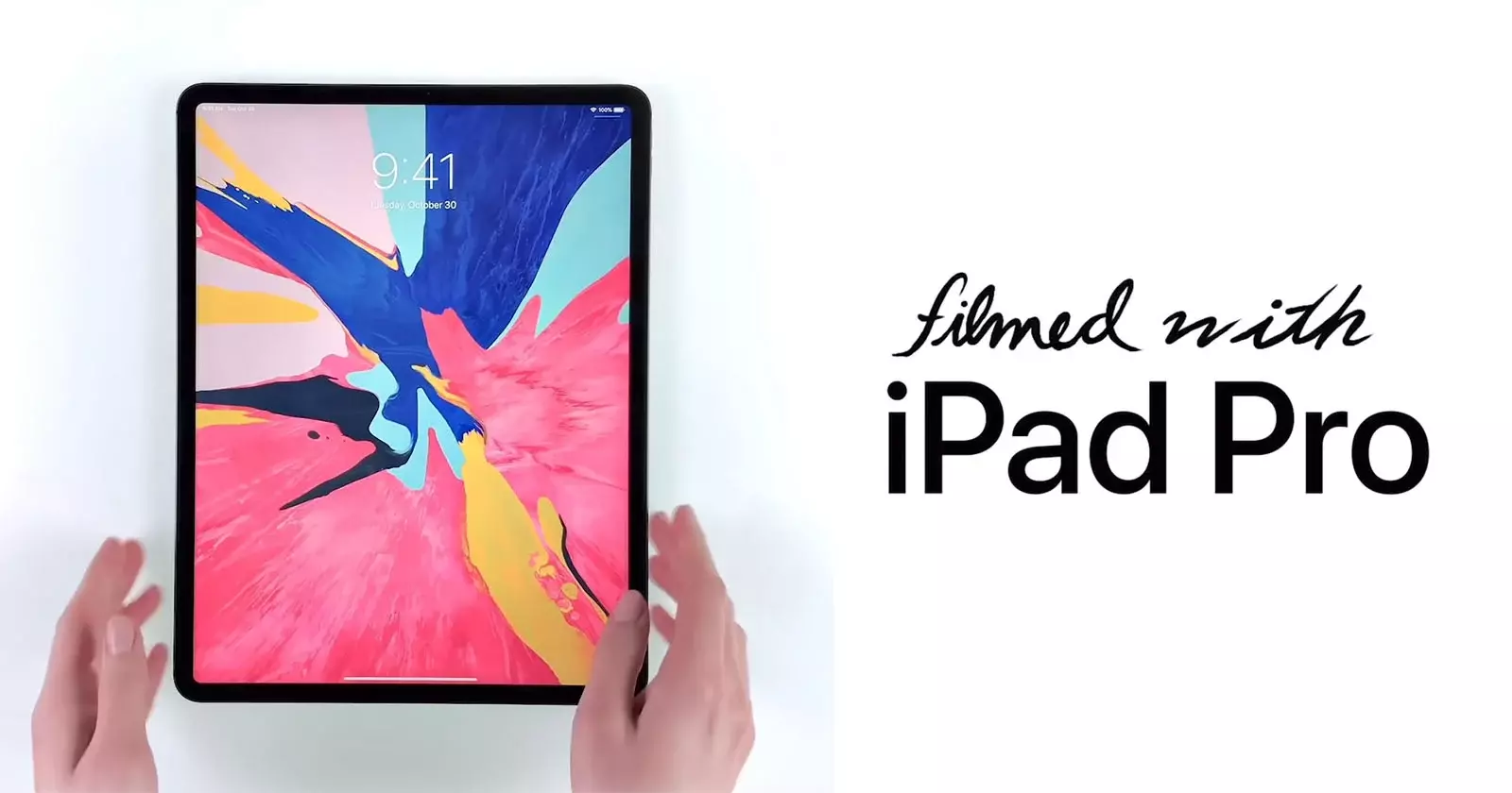 iPad Pro con pantalla encendida mostrando fondo artístico colorido, acompañado del texto 'Filmed with iPad Pro', ideal para compra en Pereira, Colombia.