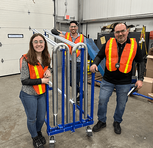 Part Cart holds U shaped pipe.