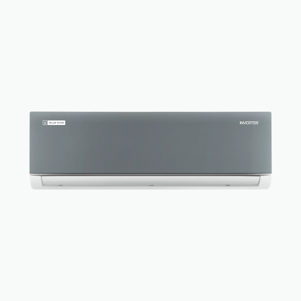 Blue Star Inverter Split AC - 1.5 Ton 3 Star cooling a small bedroom.