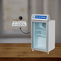 Small glass door refrigerator displaying drinks, Blue Star. Small glass door refrigerator displaying drinks, Blue Star.