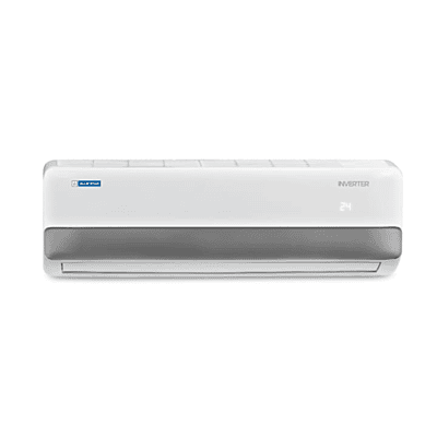 Living room with a Blue Star IC512ONUR inverter split AC unit.