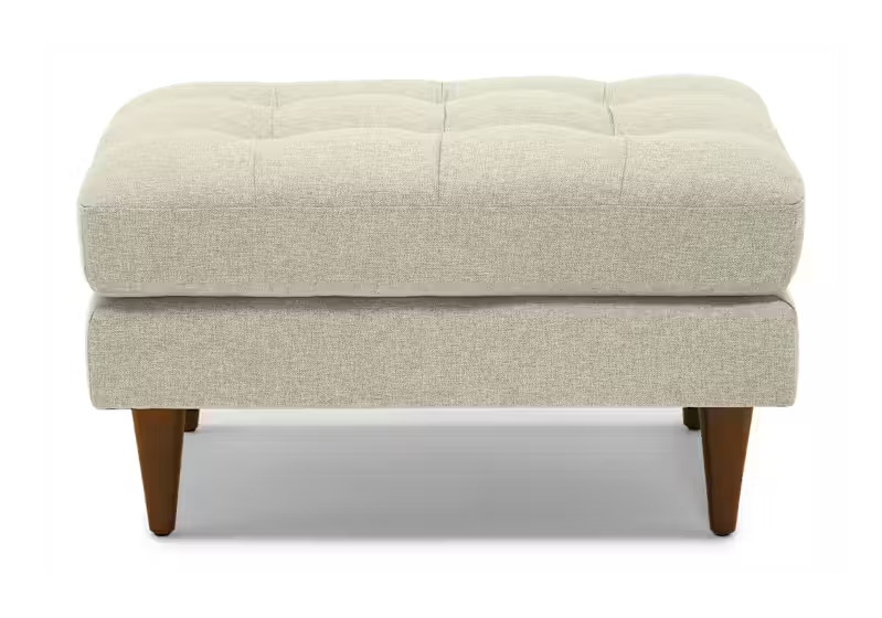 Modern Tufted Cream Ottoman | Beige Fabric Footstool with Tapered Wood Legs Modern Tufted Cream Ottoman | Beige Fabric Footstool with Tapered Wood Legs