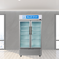 Customers browsing products in a Blue Star VC750E Visi Cooler. Customers browsing products in a Blue Star VC750E Visi Cooler.