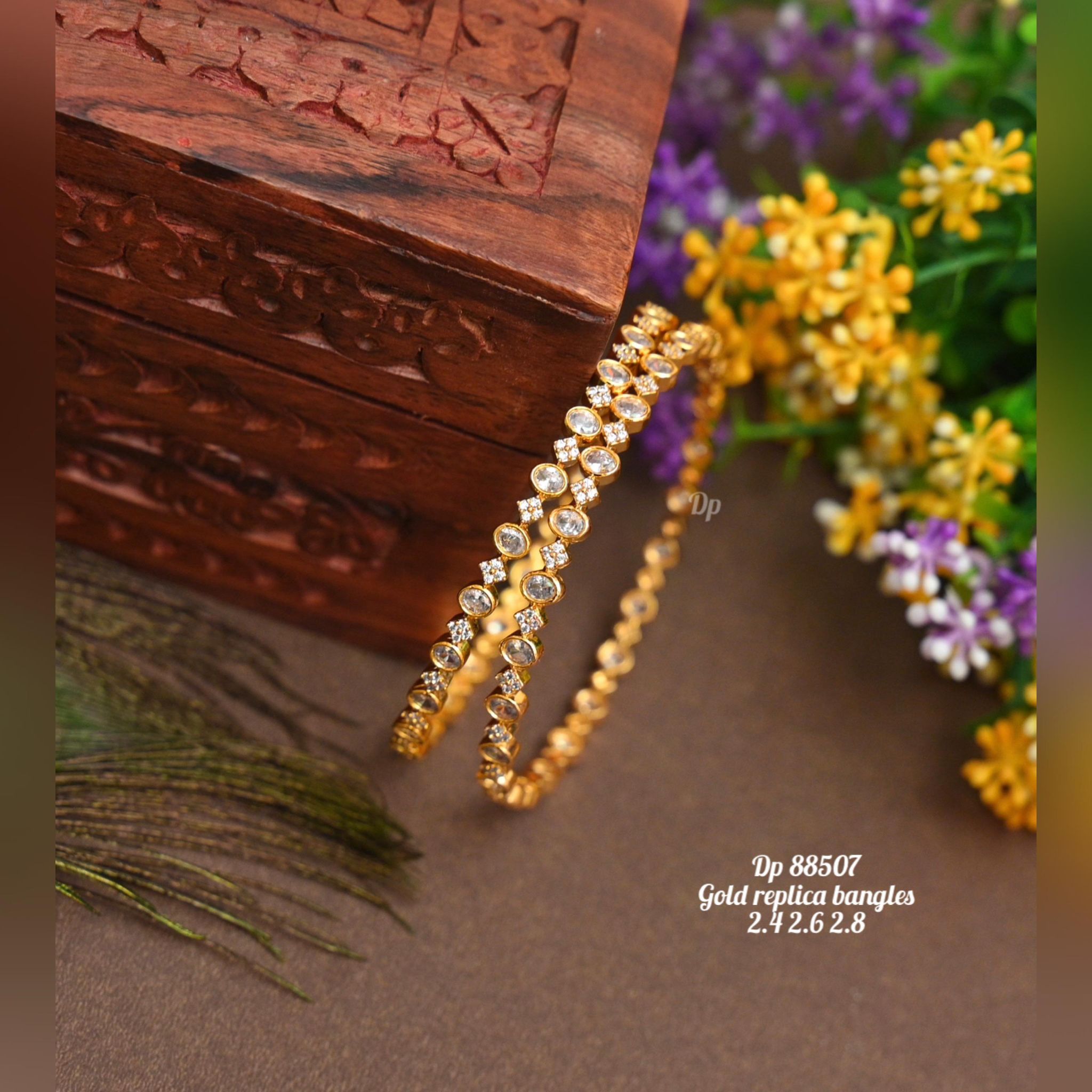 V818:Beautiful Gold Replica Bangles