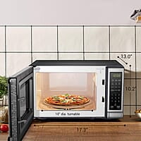 BLACK+DECKER Horno de microondas digital compacto de 700 vatios de 0.7 pies cúbicos, iluminación LED, cerradura para niños, acero inoxidable