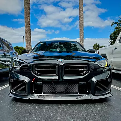 BMW G87 M2 MHC Style Carbon Fiber Front Lip (2023 - Present) BMW G87 M2 MHC Style Carbon Fiber Front Lip (2023 - Present)