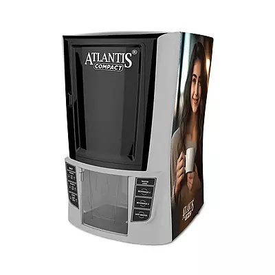 A person dispensing a fresh cup of coffee from the easy-to-use Atlantis Compact machine.