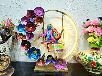 Handcrafted Radha Krishna Swing Decor with Floral Arch and LED Lighting Handcrafted Radha Krishna Swing Decor with Floral Arch and LED Lighting