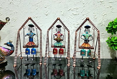 Handcrafted Rajasthani Folk Art Figurines on Swing – Set of 3 Unique Decor Pieces Handcrafted Rajasthani Folk Art Figurines on Swing – Set of 3 Unique Decor Pieces