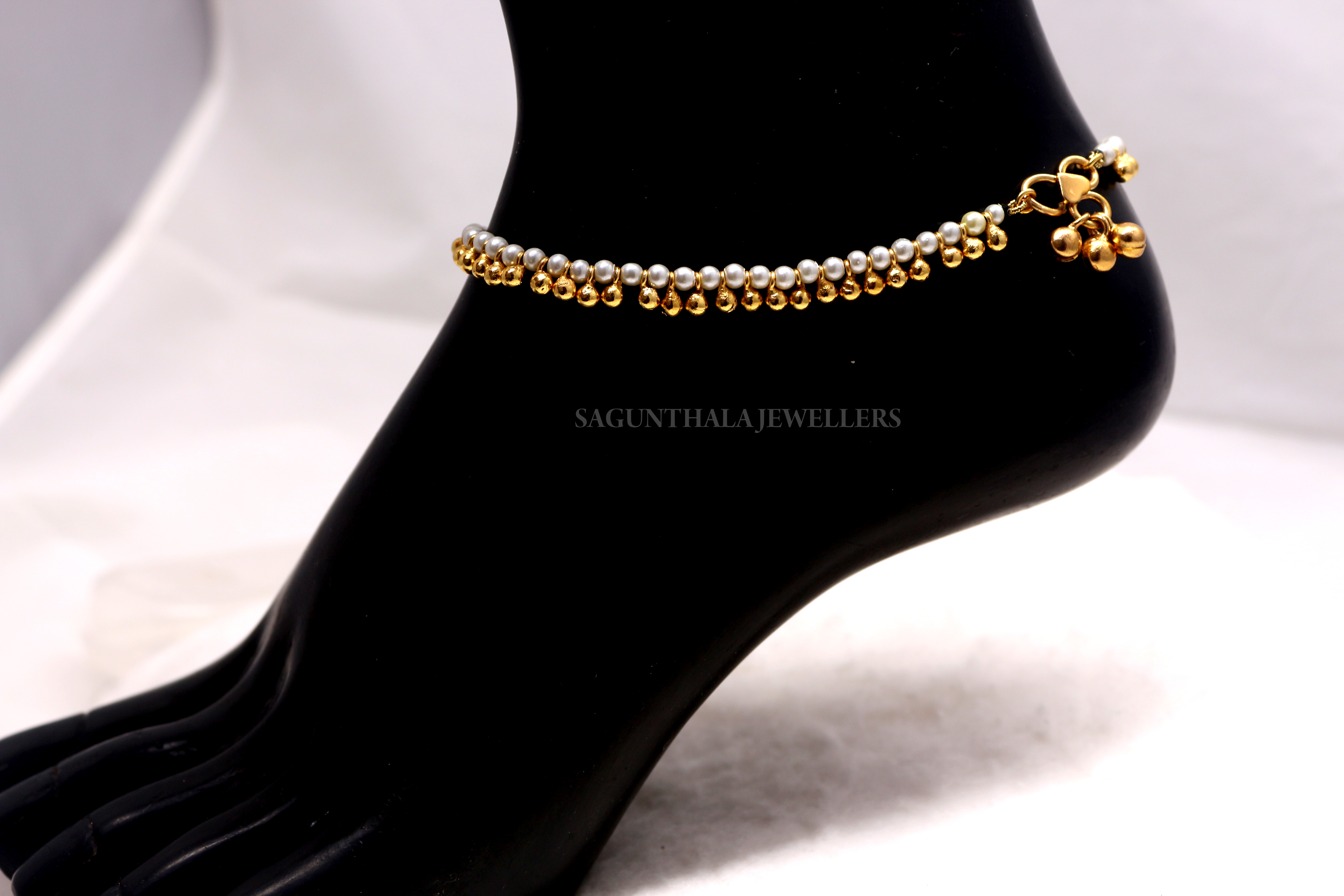 White Pearls & Gold Finish Balls Payal/Anklets White Pearls & Gold Finish Balls Payal/Anklets