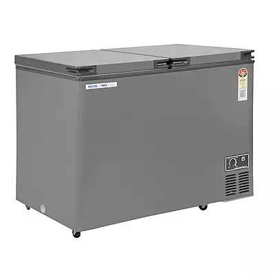 A user easily switching the temperature knob on the Voltas convertible deep freezer. A user easily switching the temperature knob on the Voltas convertible deep freezer.