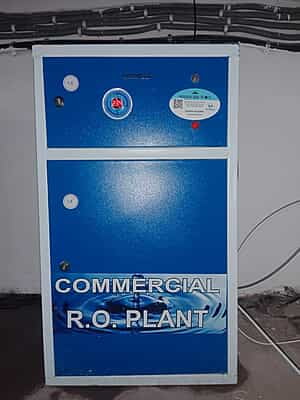 An engineer inspecting the pre-treatment vessels of the Industrial RO Plant. An engineer inspecting the pre-treatment vessels of the Industrial RO Plant.