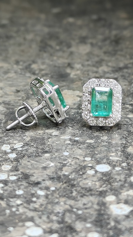 Green emerald with halo of diamond ear studs