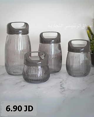 طقم بهارات زجاجي بغطاء بلاستيكي 4 قطع