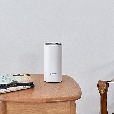 Deco E4 single unit installed in a home office to boost wireless connectivity